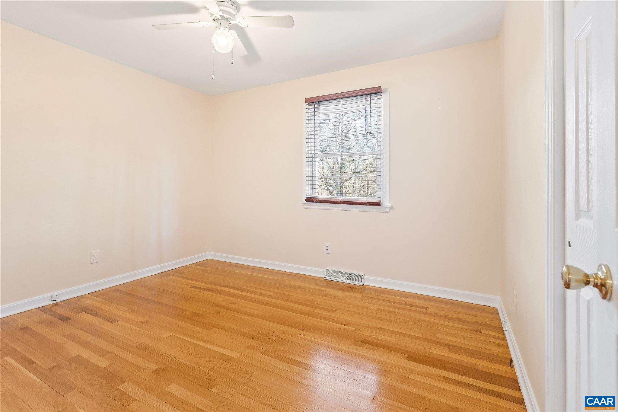 1600 Ricky Road Charlottesville, VA 22901 - Photo 18 of 34 wooden floor in an empty room with a window