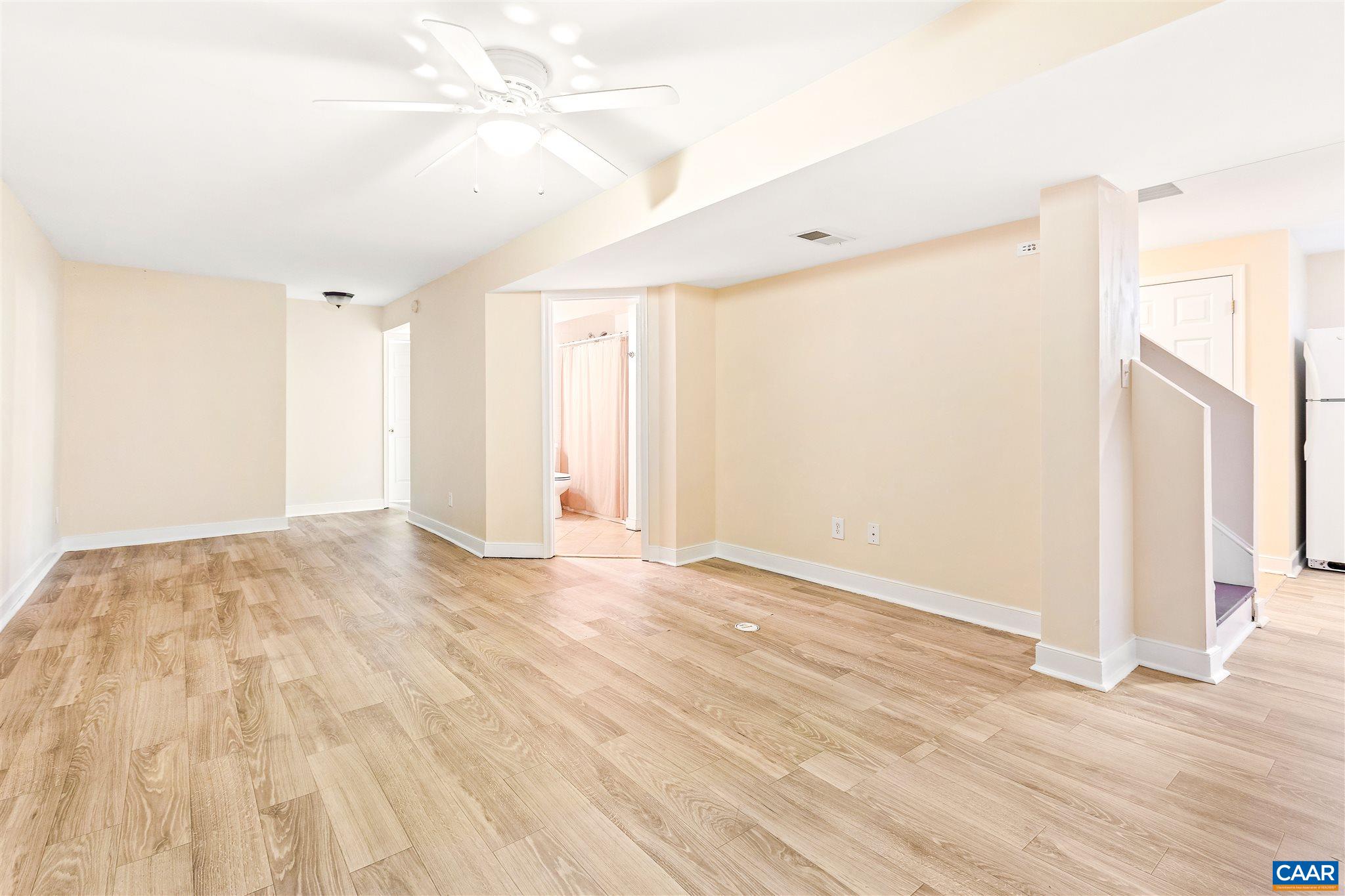 1600 Ricky Road Charlottesville, VA 22901 - Photo 22 of 34 a view of an empty room with wooden floor