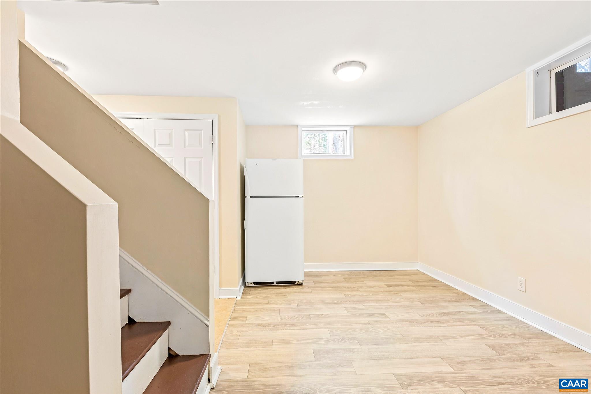 1600 Ricky Road Charlottesville, VA 22901 - Photo 23 of 34 a view of an empty room with wooden floor