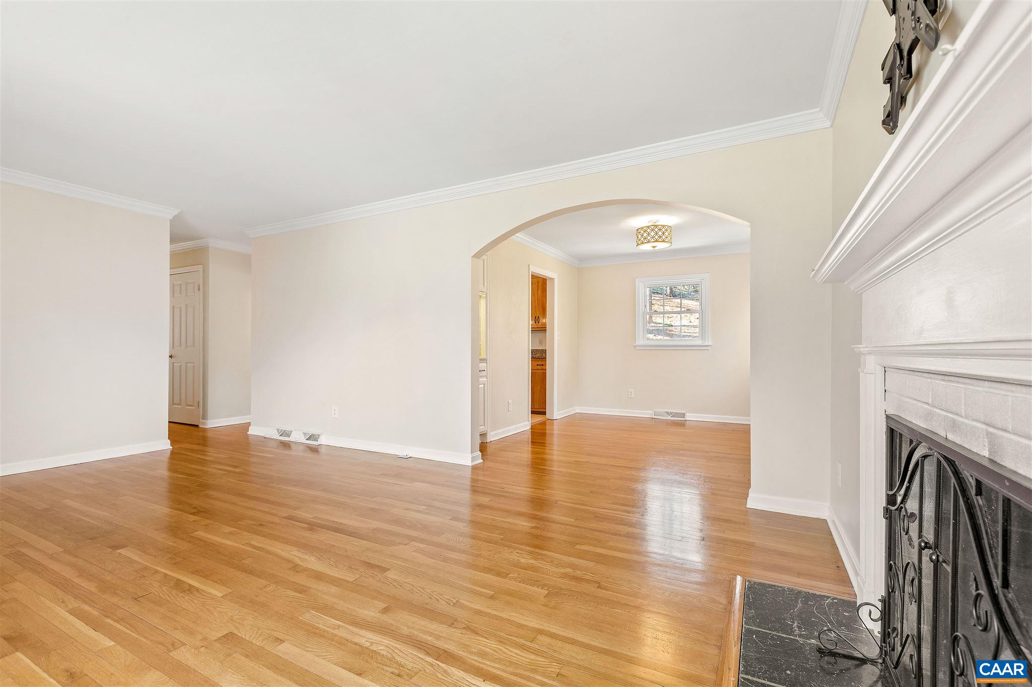 1600 Ricky Road Charlottesville, VA 22901 - Photo 6 of 34 a view of empty room with wooden floor and fireplace