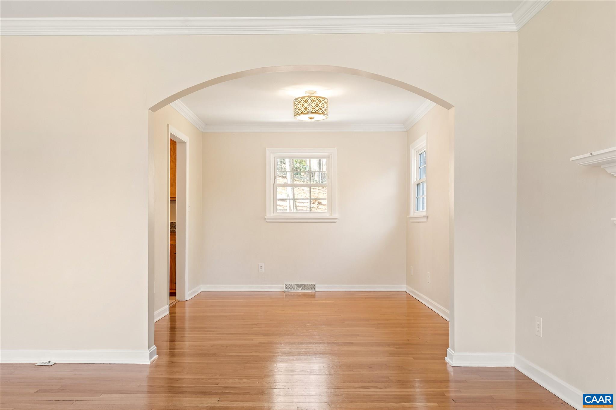 1600 Ricky Road Charlottesville, VA 22901 - Photo 7 of 34 a view of a hallway with wooden floor and a window