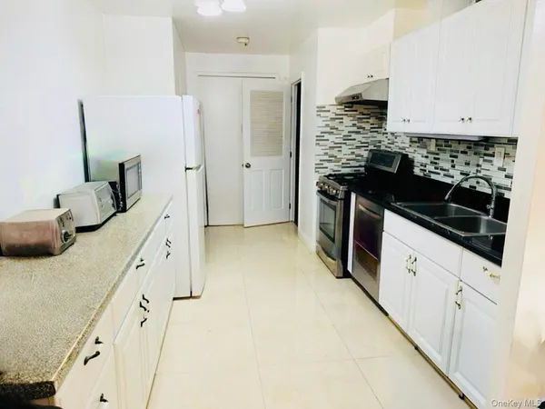 $500,000 | 80-06 47th Avenue, Unit 1A ONE PARKING SPOT | Elmhurst