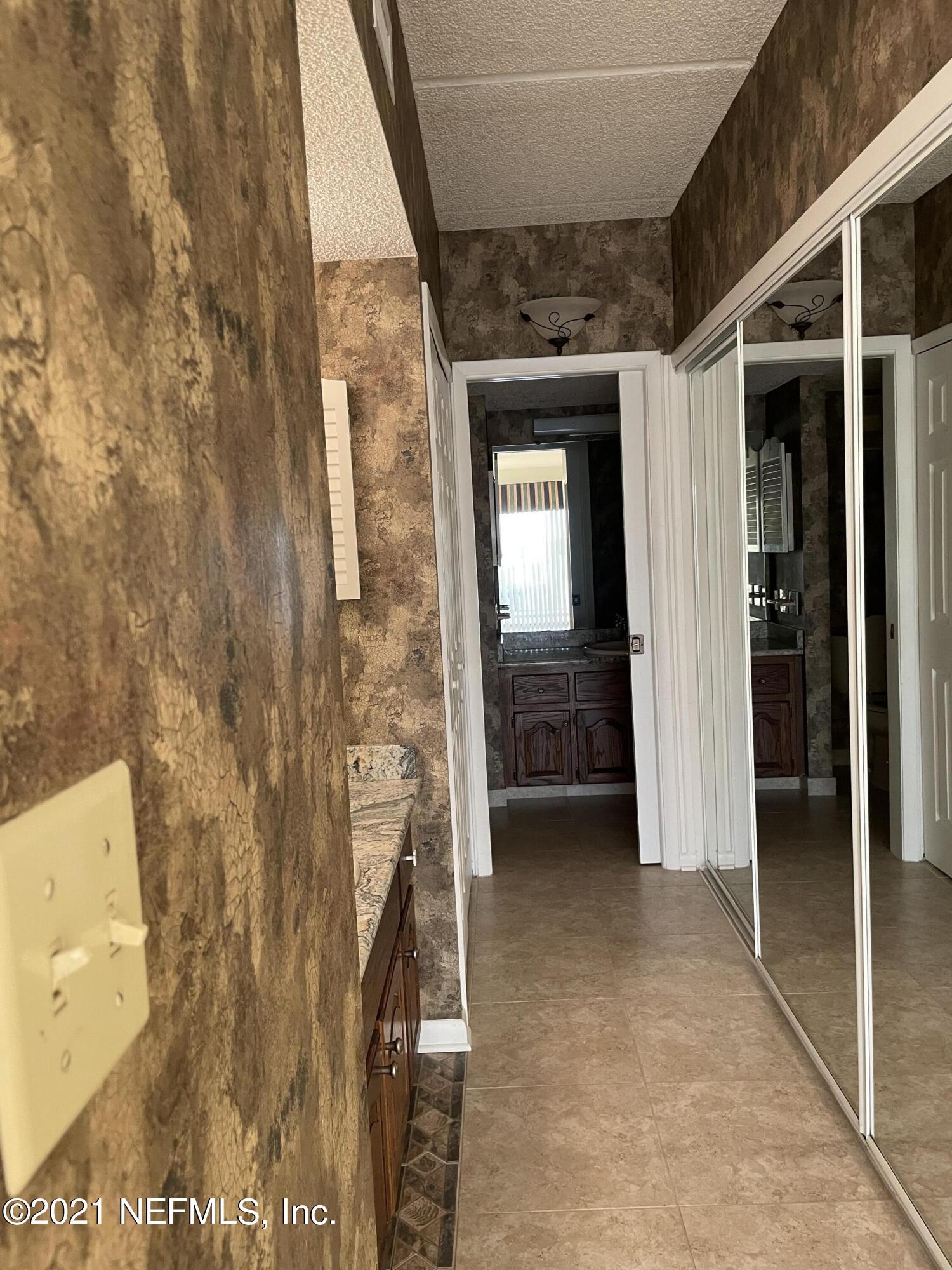 2280 Shepard Street, Unit 406 Jacksonville, FL 32211 - Photo 13 of 28 Primary Hall Closet