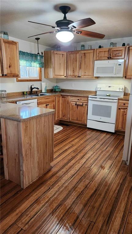 603 Dry Ridge Road West Alexander, PA 15376 - Photo 3 of 21 a kitchen with stainless steel appliances granite countertop a stove top oven a sink dishwasher and cabinets with wooden floor