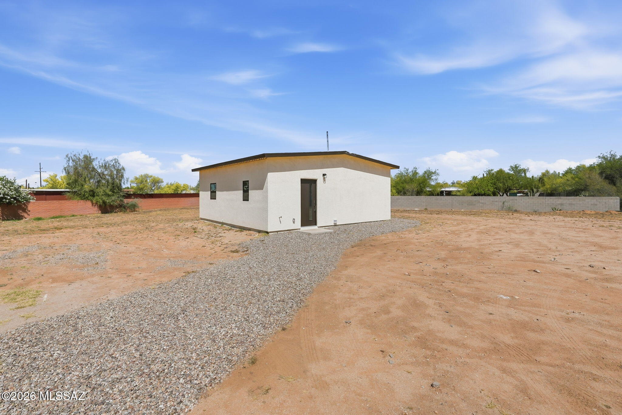 950 West Ina Road Tucson, AZ 85704 - Photo 33 of 54 a view of an outdoor space and a yard