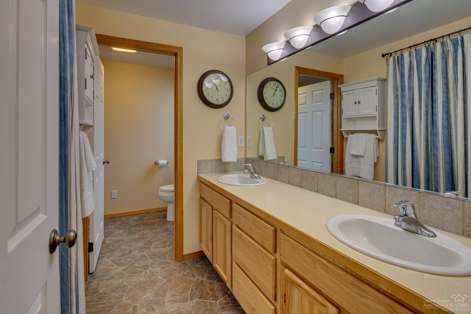 20564 Slalom Way Bend, OR 97702 - Photo 14 of 23 Master bathroom with an enclosed shower
