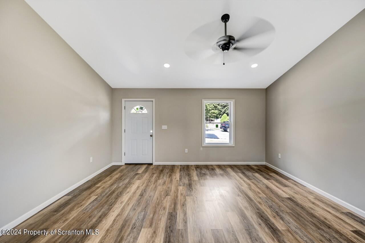 551 Back Street Scranton, PA 18504 - Photo 20 of 47 wooden floor in an empty room with a window