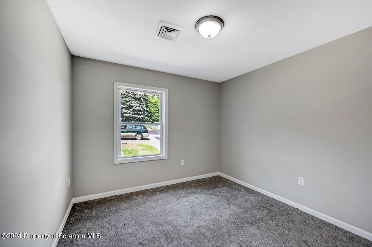 551 Back Street Scranton, PA 18504 - Photo 30 of 47 an empty room with windows