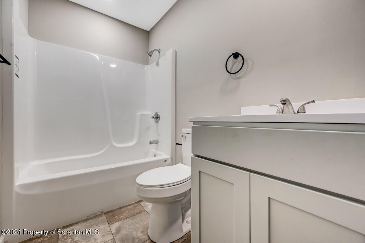 551 Back Street Scranton, PA 18504 - Photo 34 of 47 a bathroom with a sink a toilet and shower