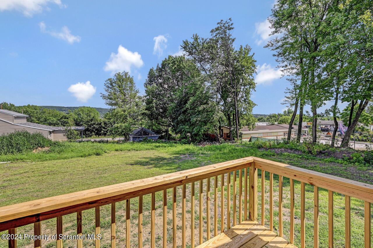 551 Back Street Scranton, PA 18504 - Photo 43 of 47 a view of a wooden deck and a garden