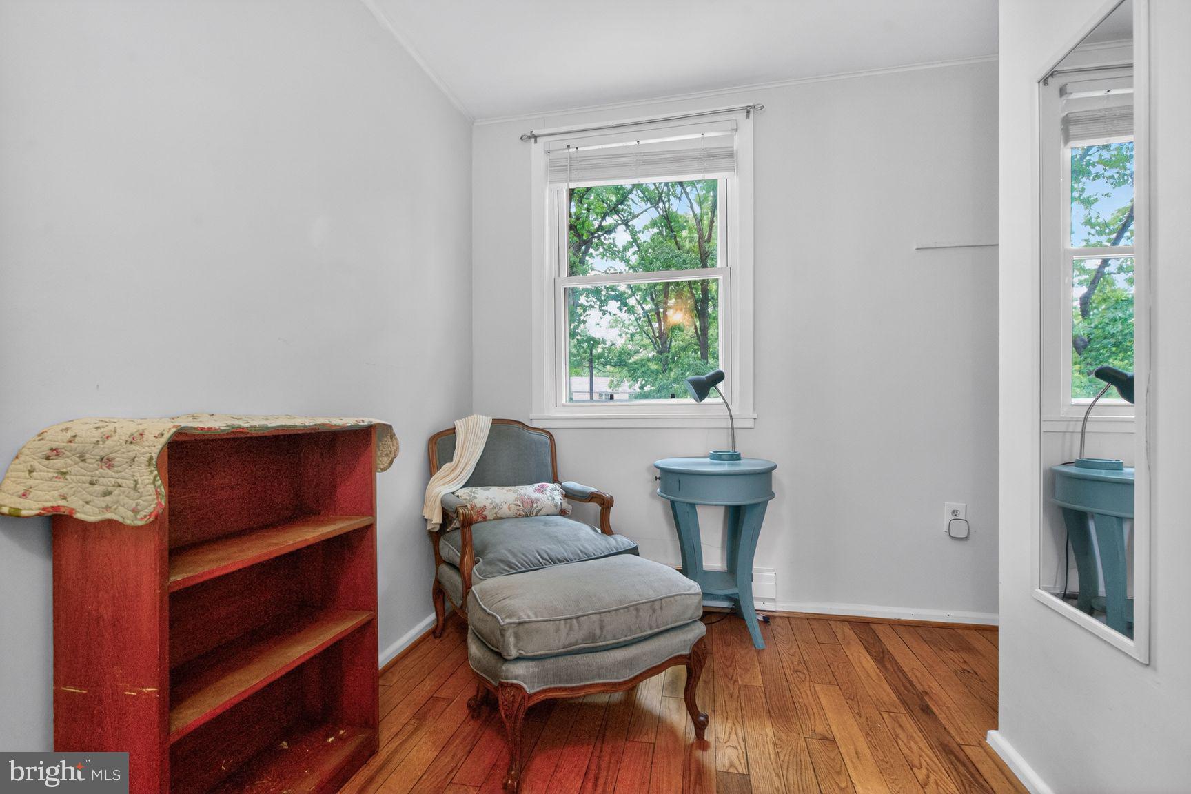 51 Ridge Road Greenbelt, MD 20770 - Photo 14 of 23 a living room with furniture and a window