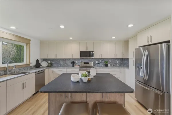 a view of a hallway with some storage area
