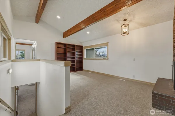 a bedroom with a bed and a cabinets