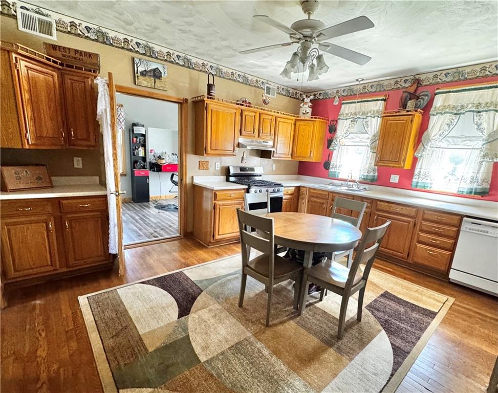 211 Stephens Street Vanderbilt, PA 15486 - Photo 11 of 48 a view of a dining room with furniture window and wooden floor