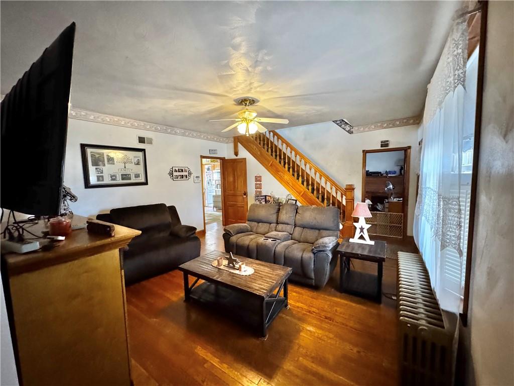 211 Stephens Street Vanderbilt, PA 15486 - Photo 13 of 48 a living room with furniture and a flat screen tv