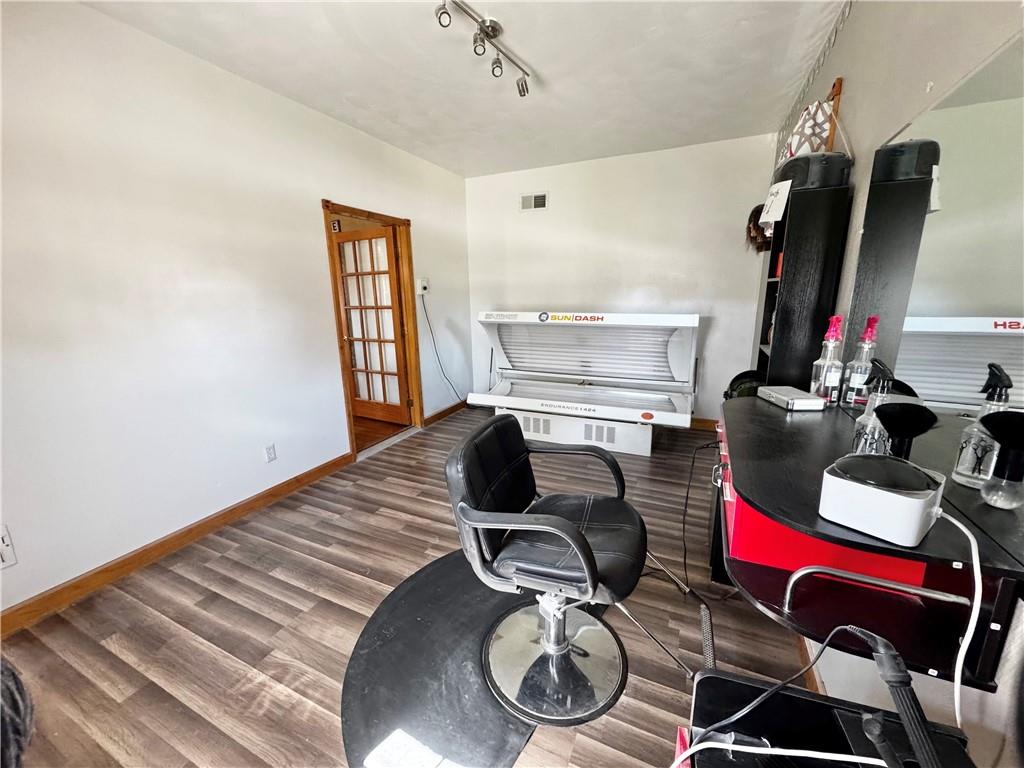 211 Stephens Street Vanderbilt, PA 15486 - Photo 17 of 48 a room with gym equipment and wooden floor