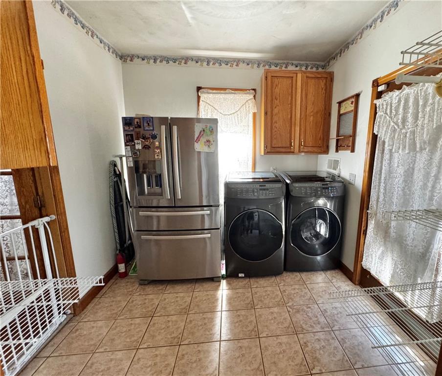 211 Stephens Street Vanderbilt, PA 15486 - Photo 21 of 48 a kitchen with a refrigerator and a stove