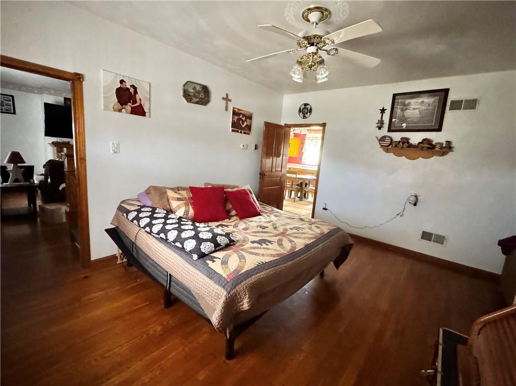 211 Stephens Street Vanderbilt, PA 15486 - Photo 27 of 48 a living room with furniture and a flat screen tv