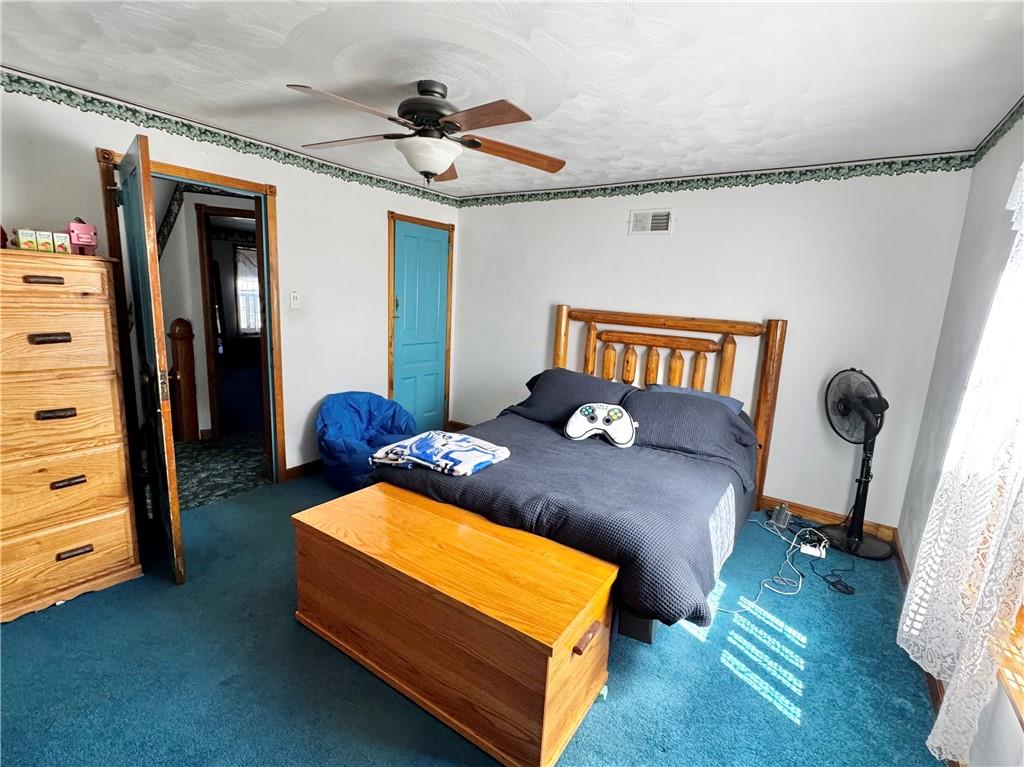 211 Stephens Street Vanderbilt, PA 15486 - Photo 32 of 48 a bed room with a bed