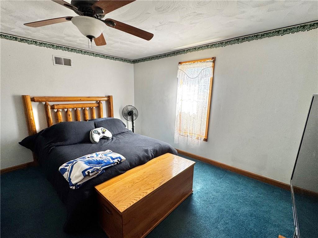 211 Stephens Street Vanderbilt, PA 15486 - Photo 33 of 48 a bed room with a bed and a window