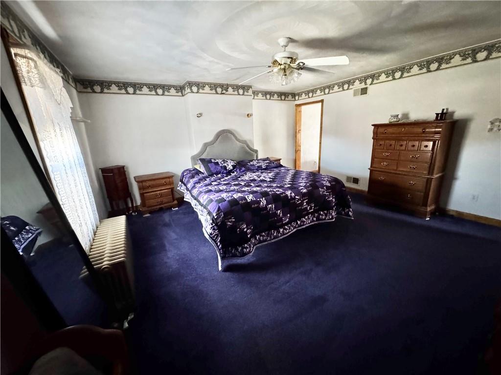 211 Stephens Street Vanderbilt, PA 15486 - Photo 35 of 48 a bed room with furniture and a window