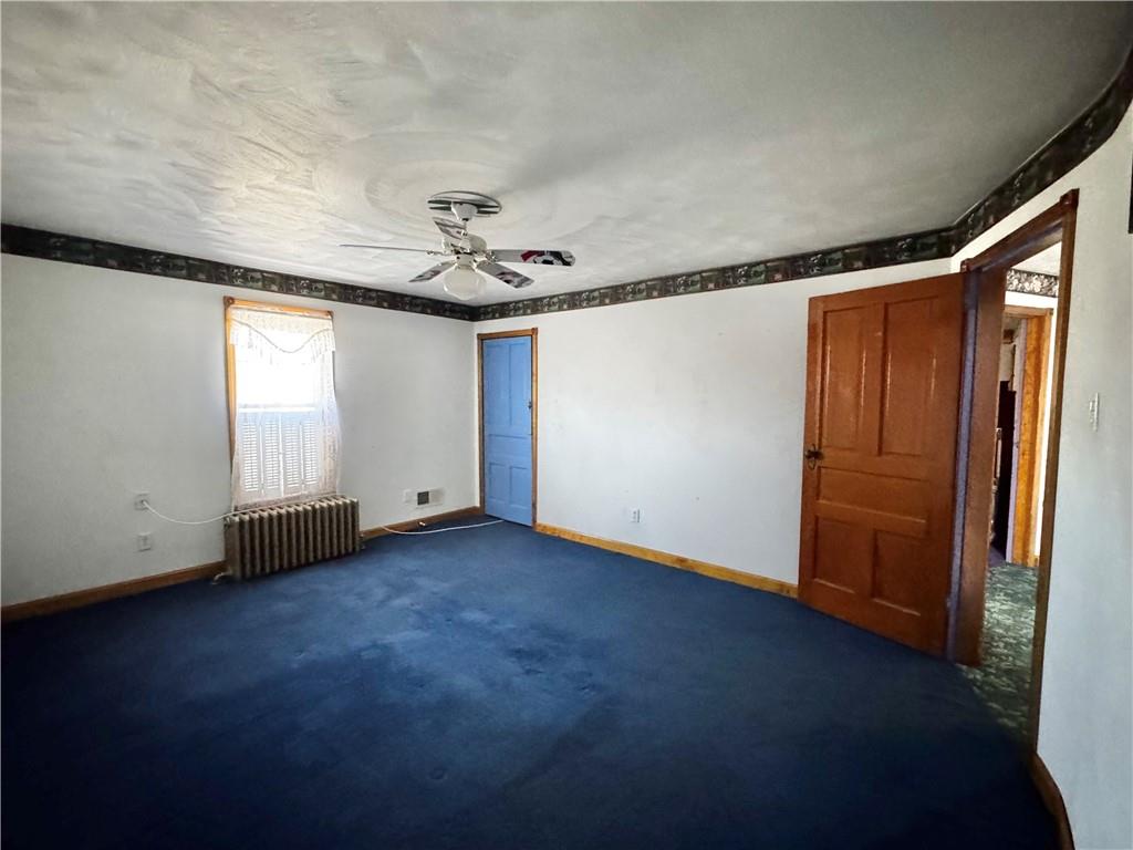 211 Stephens Street Vanderbilt, PA 15486 - Photo 36 of 48 an empty room with windows and closet