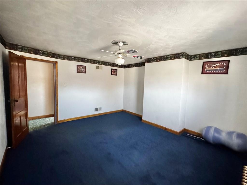 211 Stephens Street Vanderbilt, PA 15486 - Photo 37 of 48 an empty room with windows and closet