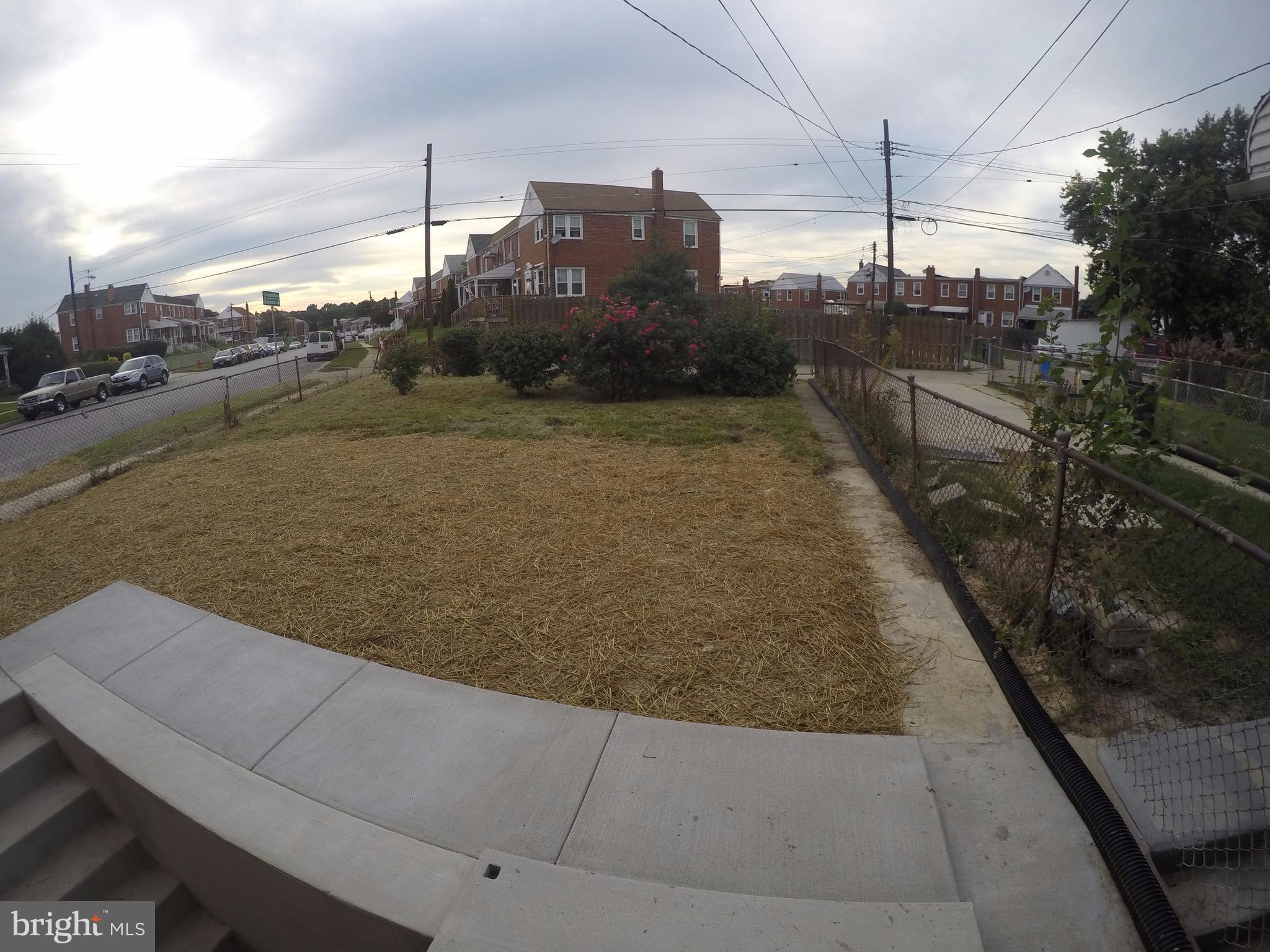 7468 Rabon Avenue Baltimore, MD 21222 - Photo 14 of 16 New Concrete Walkway, Stairwell,and Retaining Wall