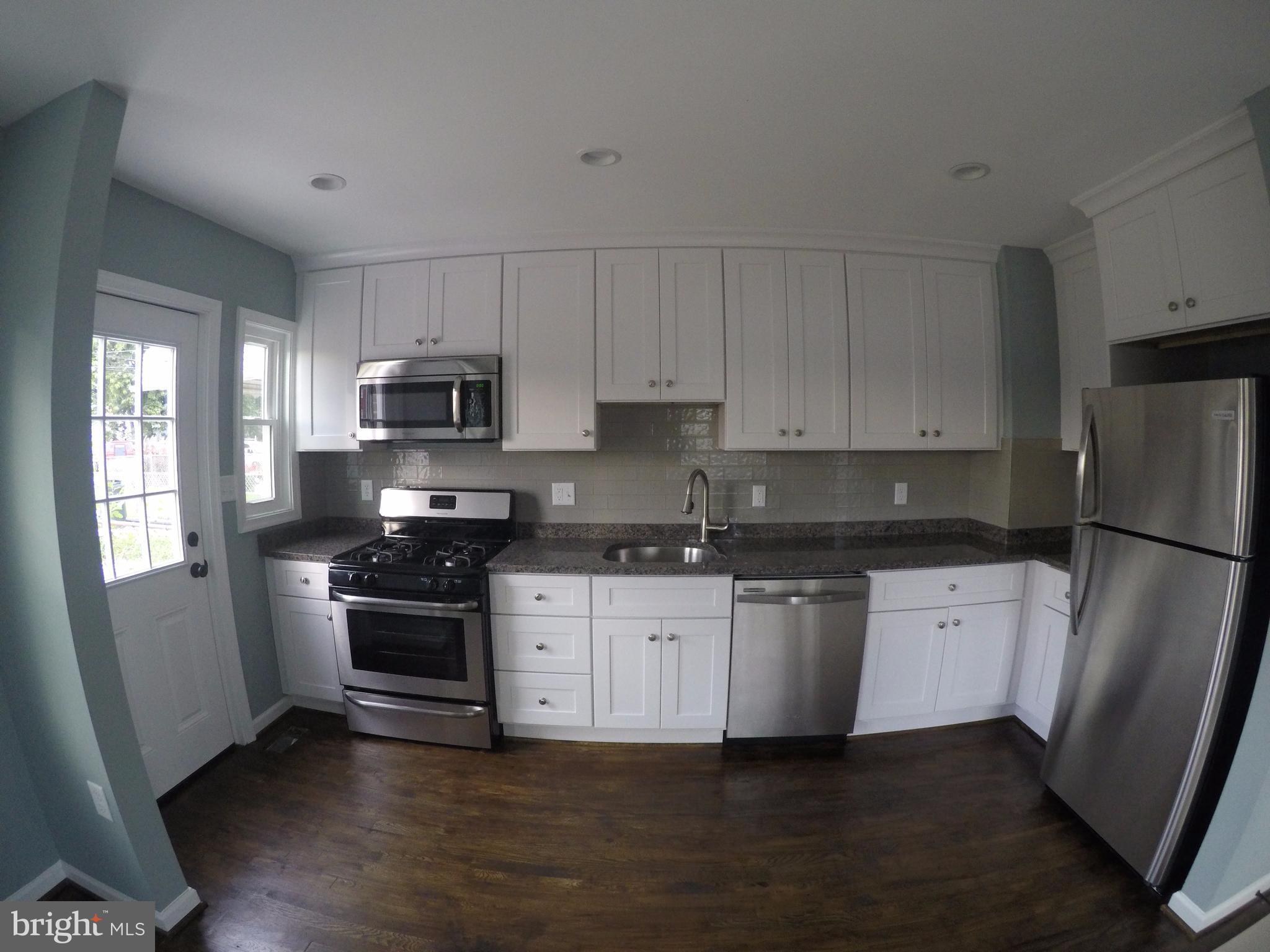 7468 Rabon Avenue Baltimore, MD 21222 - Photo 5 of 16 Modern Designer Kitchen - Granite- S/S Appliances