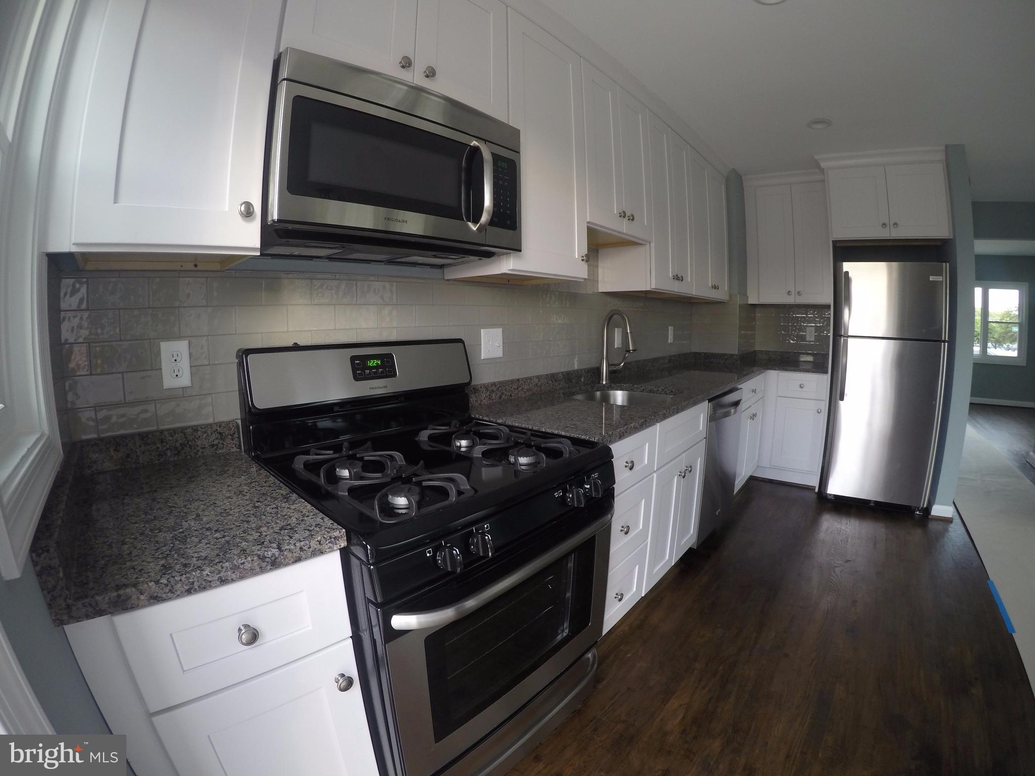 7468 Rabon Avenue Baltimore, MD 21222 - Photo 6 of 16 Elongated Modern Kitch 15'x7'Open to Dining Area
