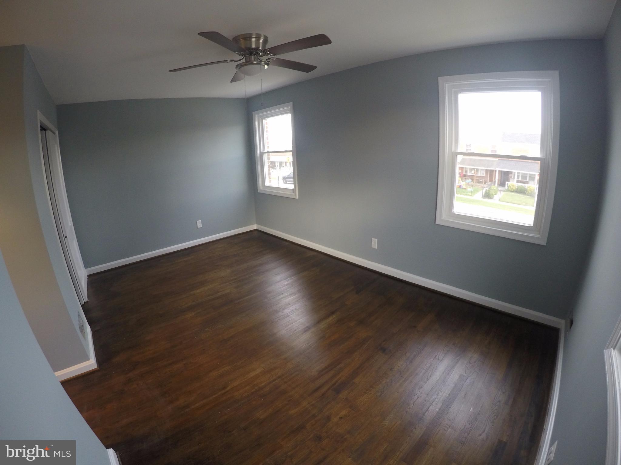 7468 Rabon Avenue Baltimore, MD 21222 - Photo 8 of 16 Largest Bedroom 15'x10';Ceiling Fan;3 Windows