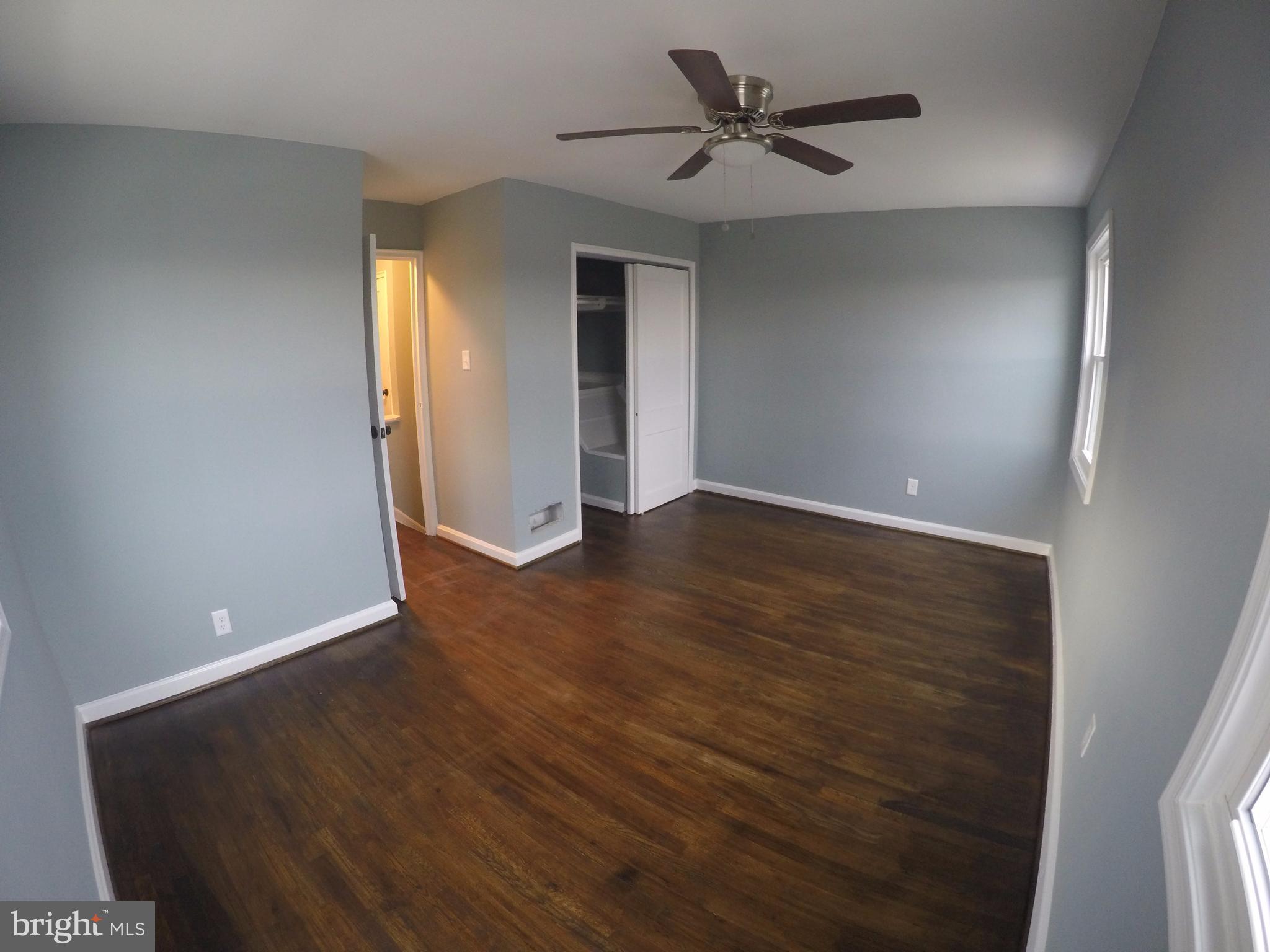 7468 Rabon Avenue Baltimore, MD 21222 - Photo 9 of 16 Largest Bedroom with Long Hanging Closet + Storage