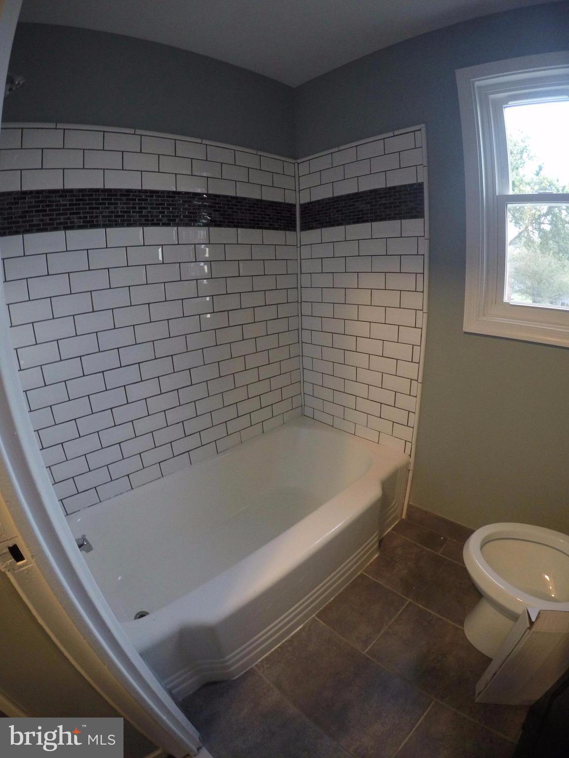 7468 Rabon Avenue Baltimore, MD 21222 - Photo 10 of 16 Designer Bath with Ceramic and Glass Tiles