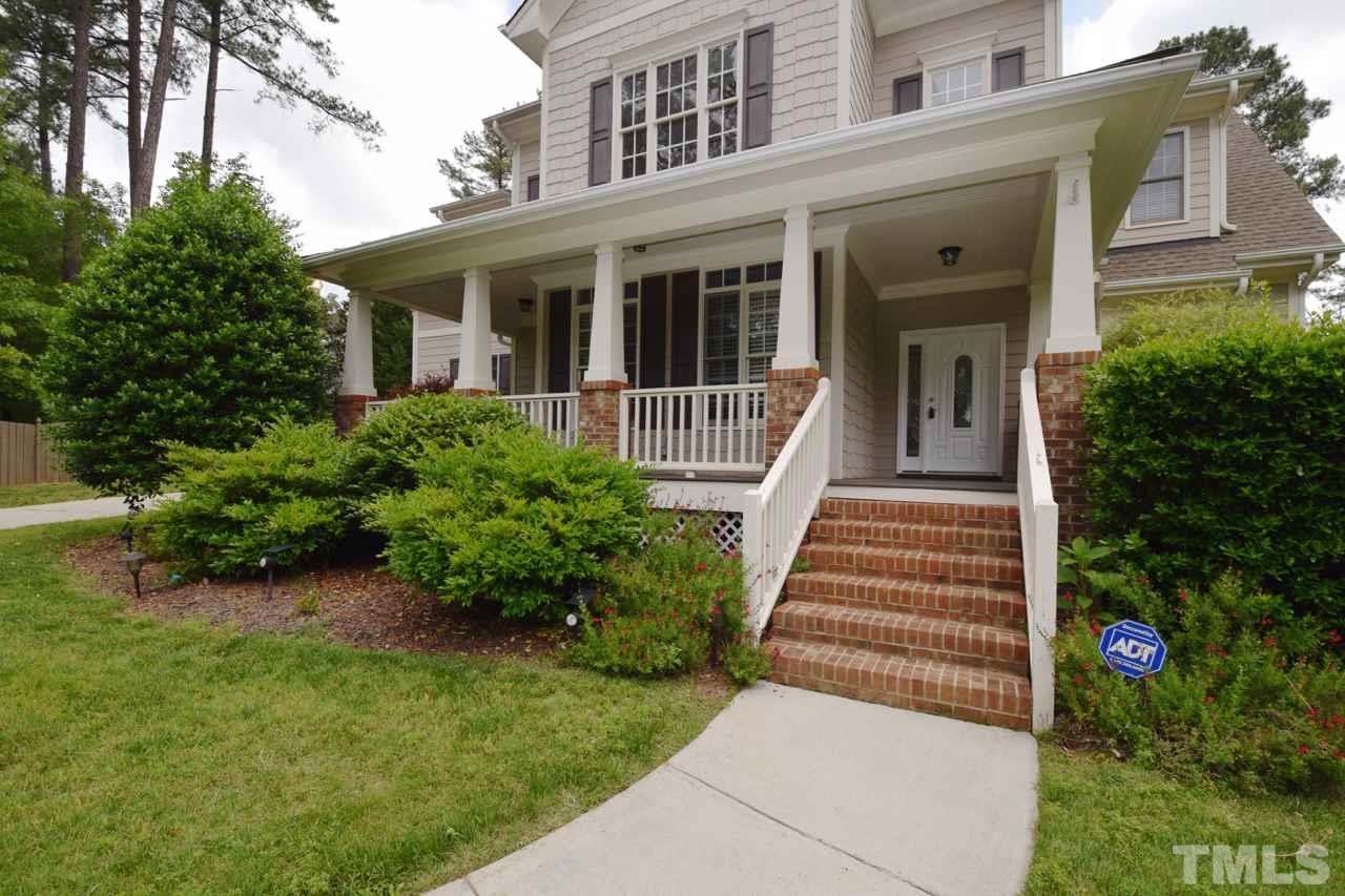 10320 Old Creedmoor Road Raleigh, NC 27613 - Photo 3 of 25 front view of a house with a yard