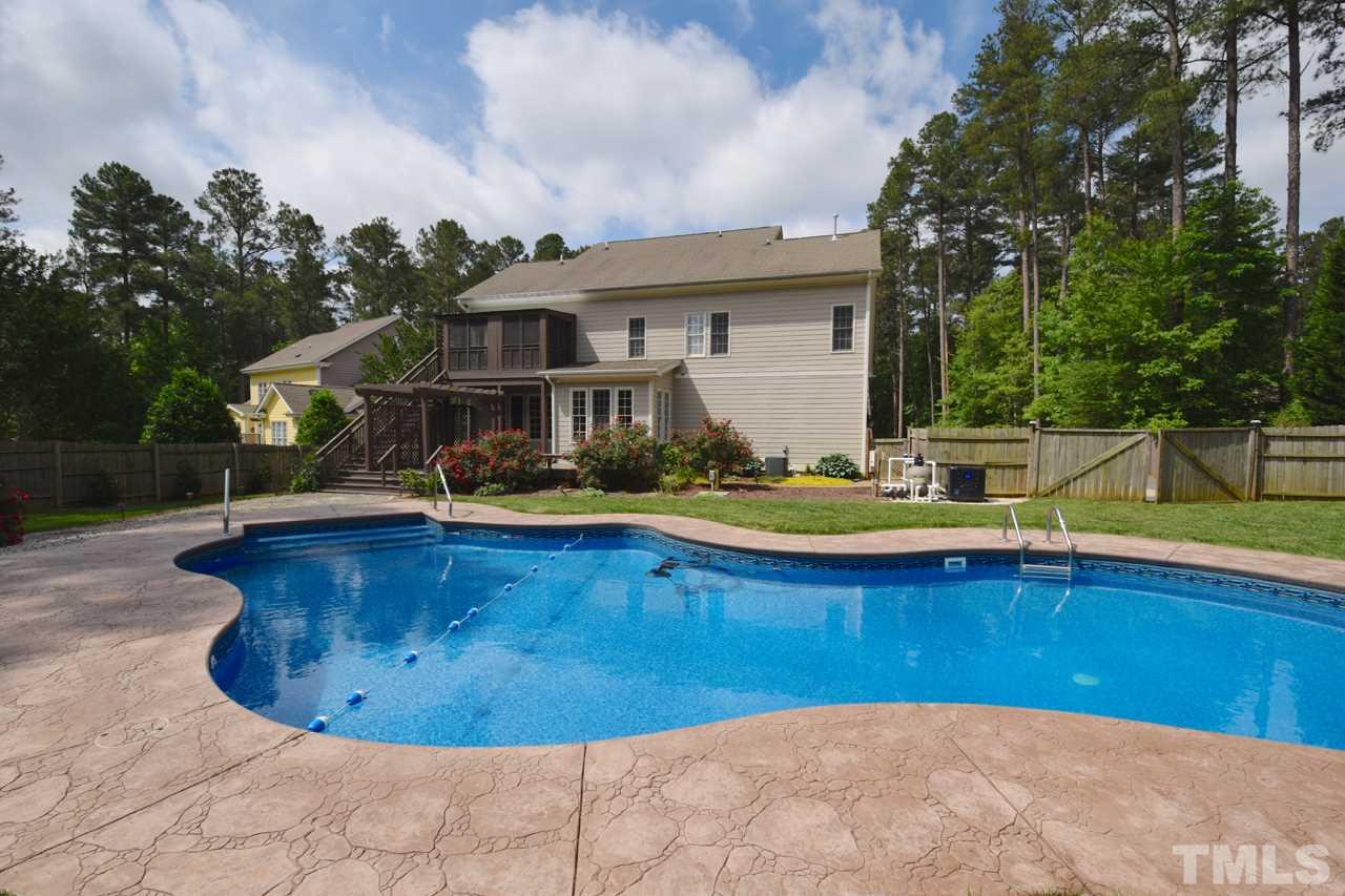 10320 Old Creedmoor Road Raleigh, NC 27613 - Photo 5 of 25 a view of swimming pool with outdoor seating