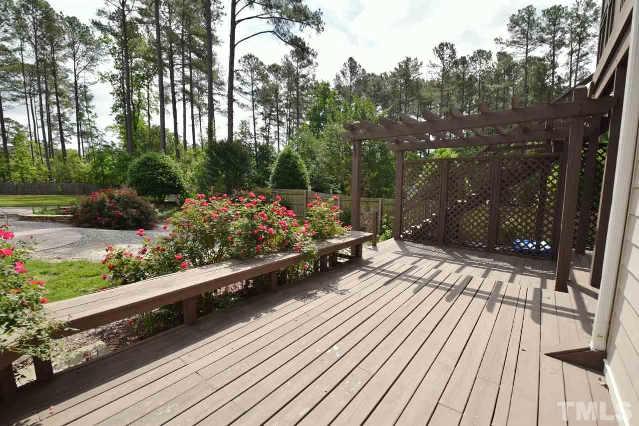 10320 Old Creedmoor Road Raleigh, NC 27613 - Photo 7 of 25 a view of a wooden deck