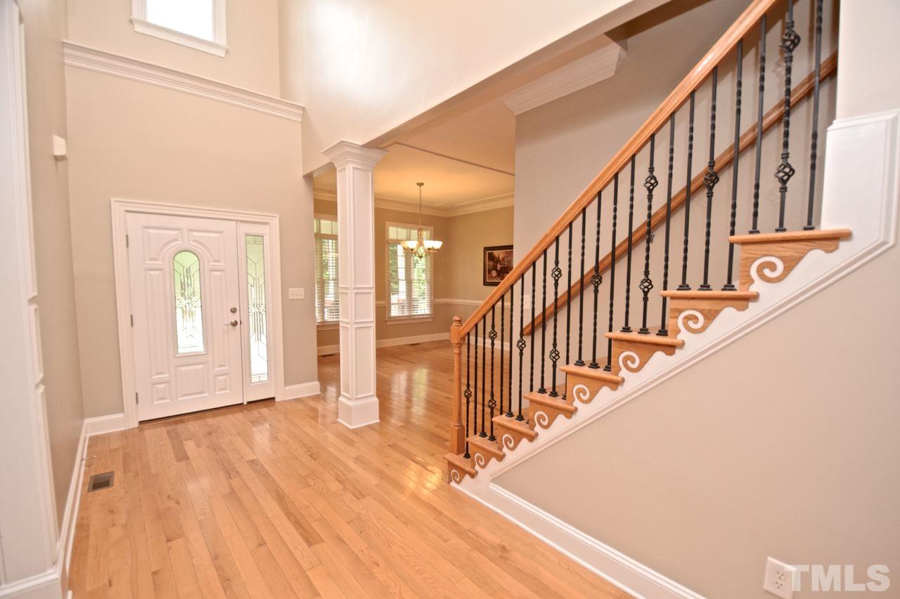 10320 Old Creedmoor Road Raleigh, NC 27613 - Photo 10 of 25 a view of an entryway with wooden floor