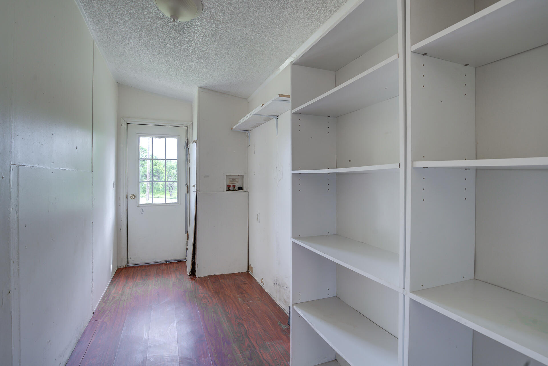 4450 Locust Road Anderson, CA 96007 - Photo 19 of 40 a view of an empty walk in closet