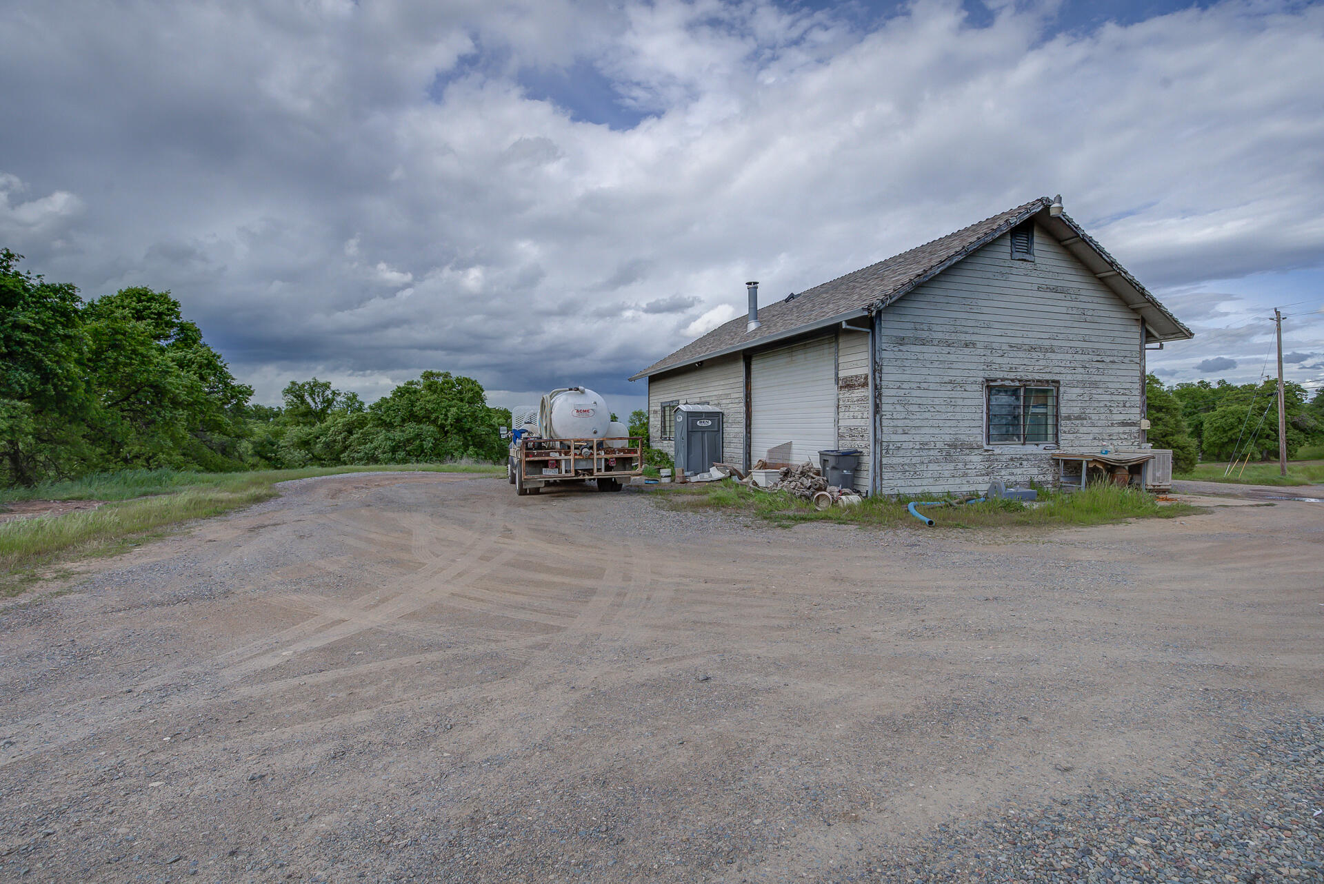 4450 Locust Road Anderson, CA 96007 - Photo 32 of 40 a view of a house with a yard