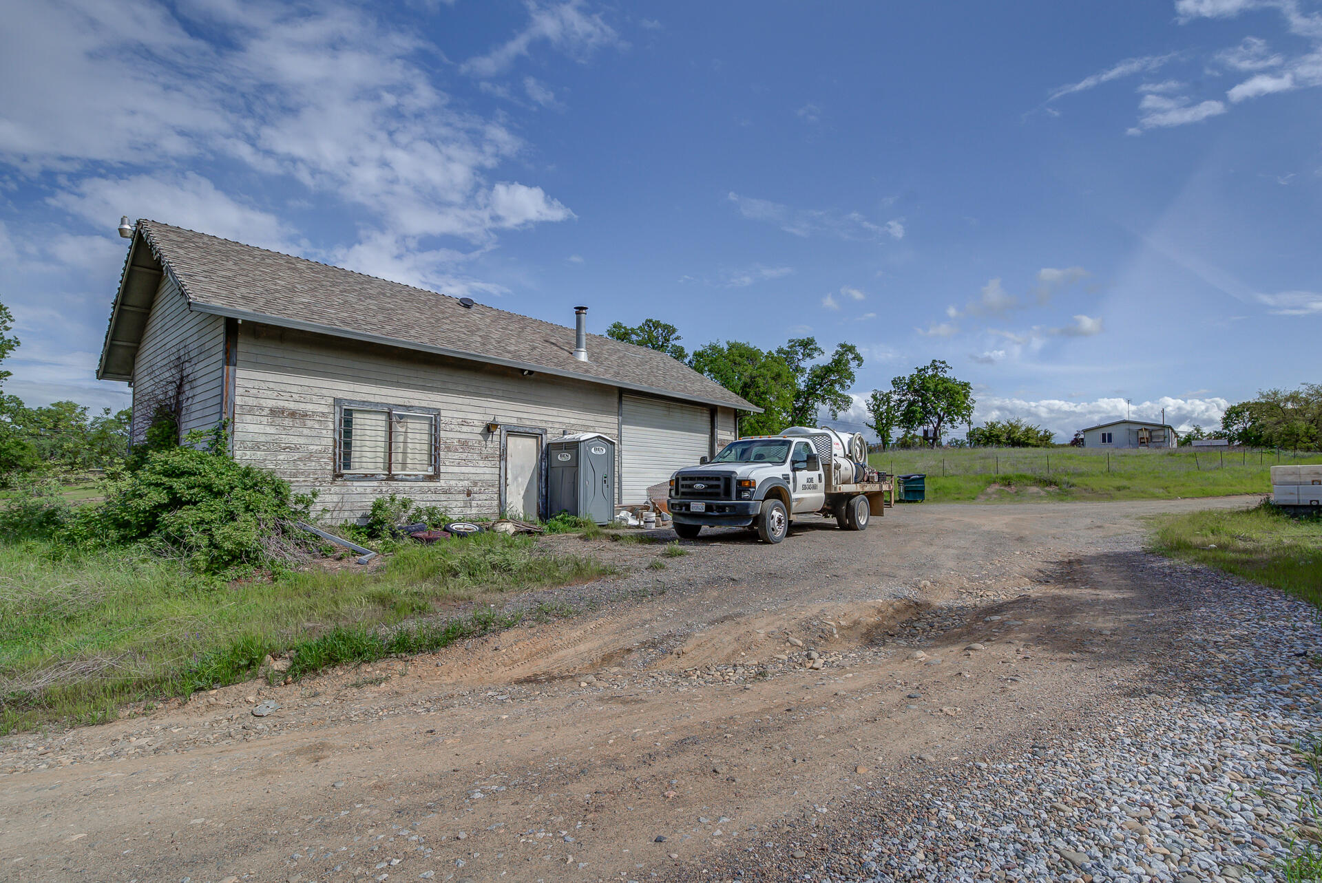 4450 Locust Road Anderson, CA 96007 - Photo 36 of 40 a view of a house with a patio