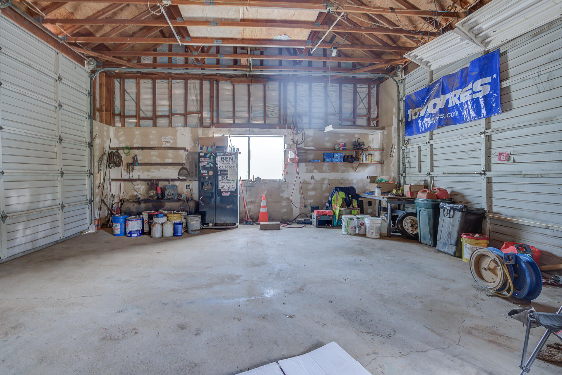 4450 Locust Road Anderson, CA 96007 - Photo 40 of 40 a view of a garage with parked cars