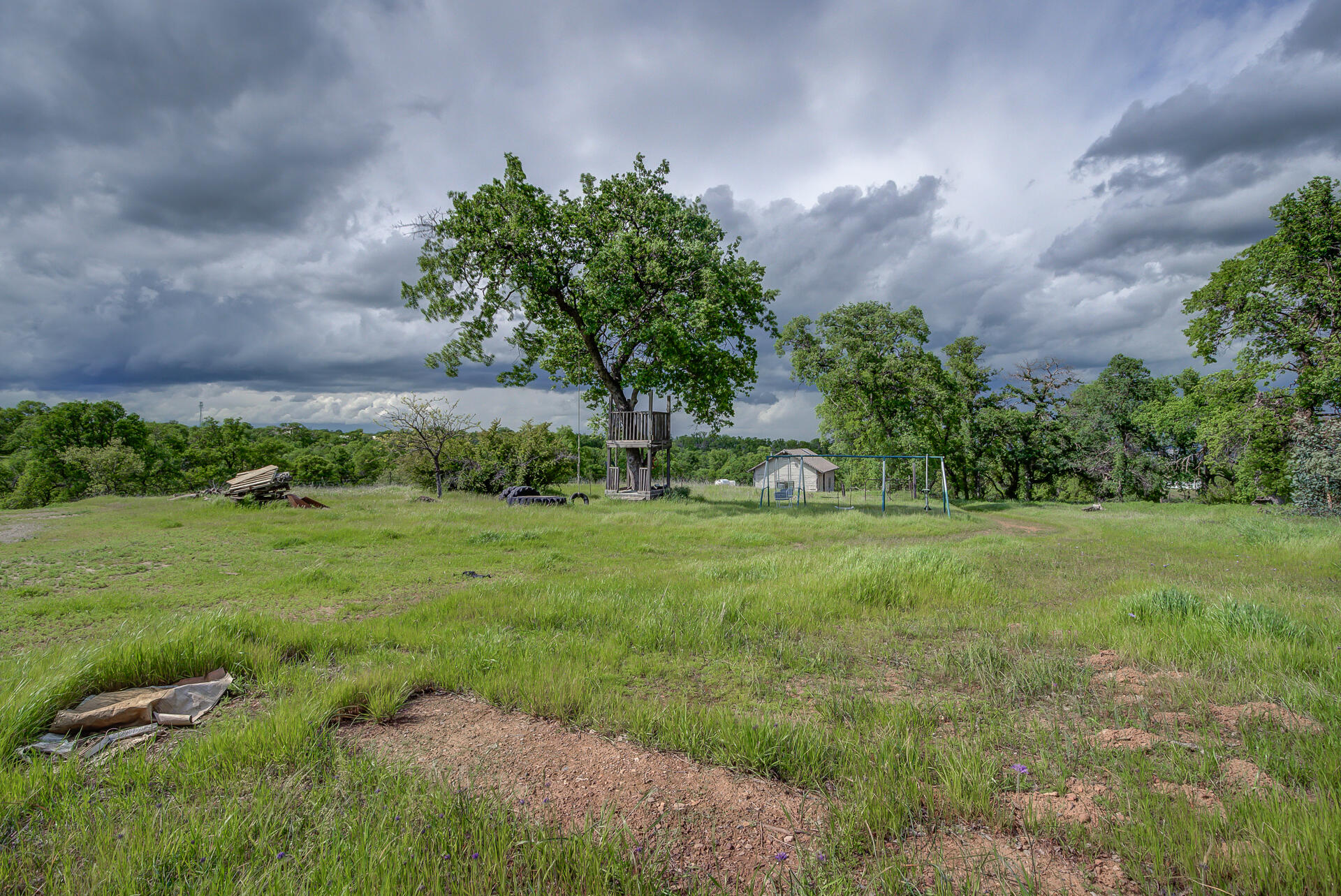 4450 Locust Road Anderson, CA 96007 - Photo 5 of 40 a view of an outdoor space and a yard