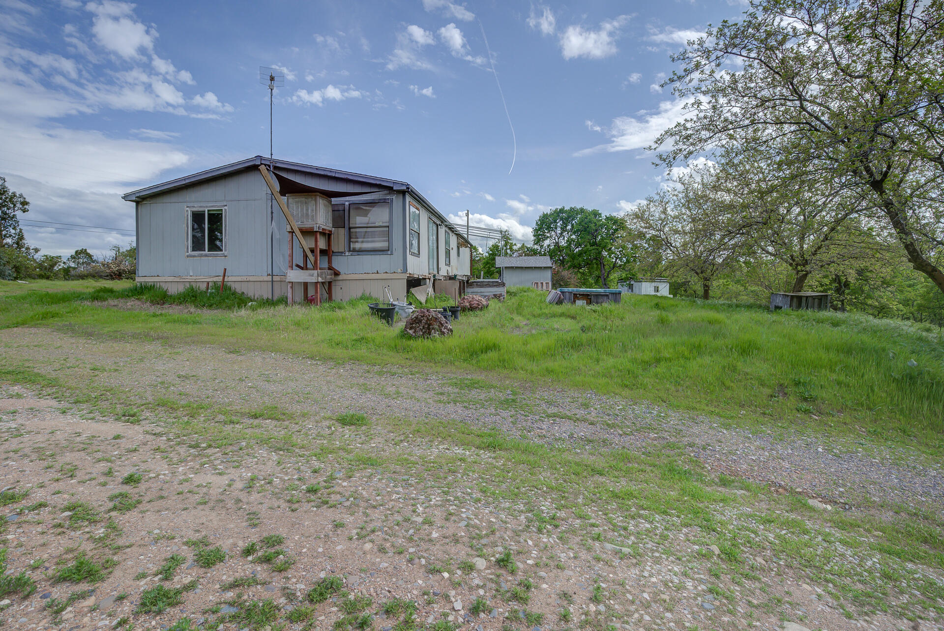 4450 Locust Road Anderson, CA 96007 - Photo 7 of 40 a front view of a house with garden
