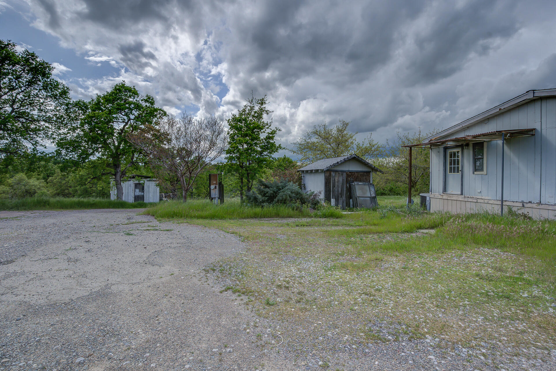 4450 Locust Road Anderson, CA 96007 - Photo 10 of 40 a view of a house with a yard