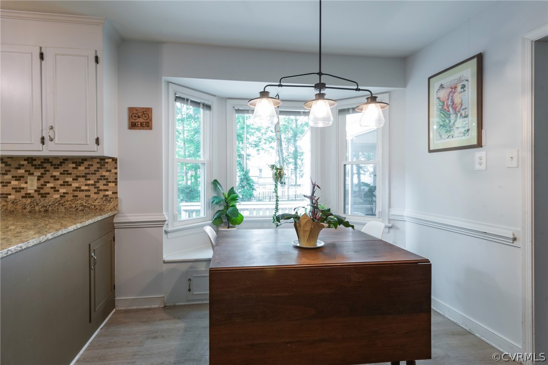 13810 Shadow Ridge Road Midlothian, VA 23112 - Photo 14 of 40 a kitchen with a table chairs and potted plant