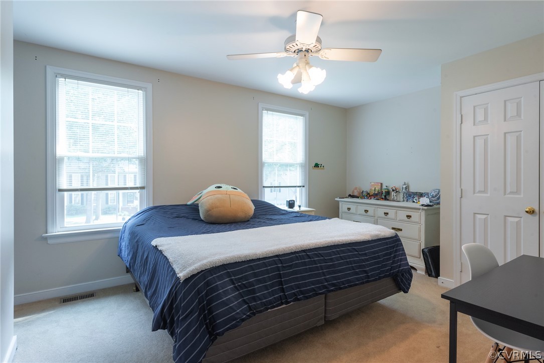 13810 Shadow Ridge Road Midlothian, VA 23112 - Photo 23 of 40 a bedroom with a bed and window