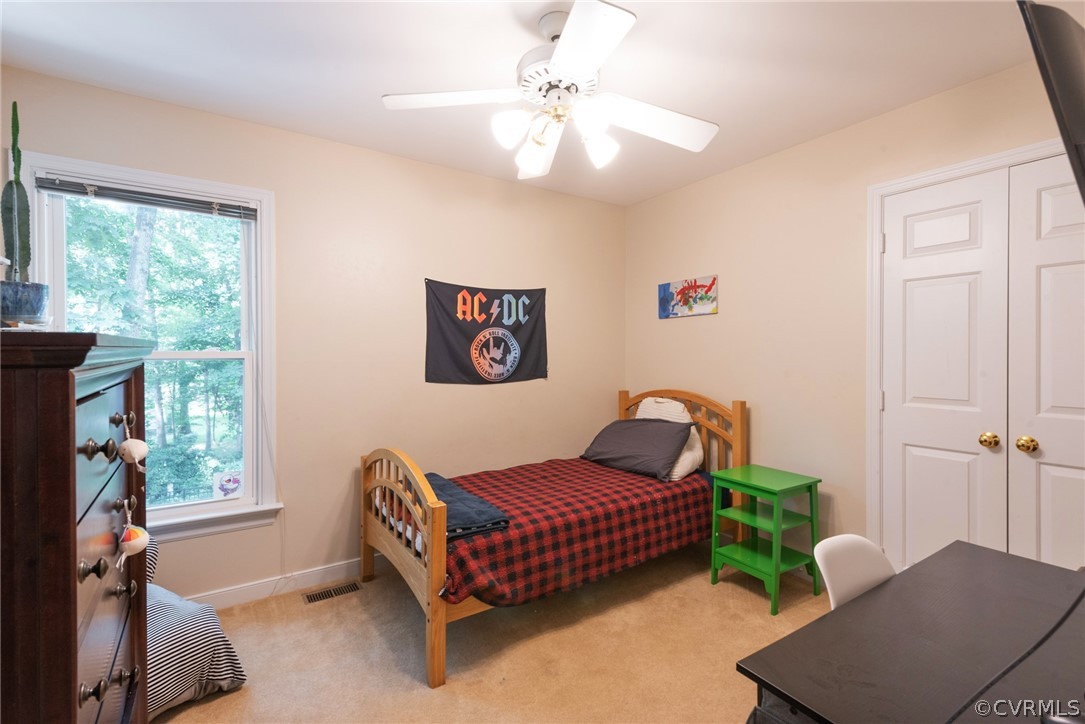 13810 Shadow Ridge Road Midlothian, VA 23112 - Photo 26 of 40 a living room with furniture and a window