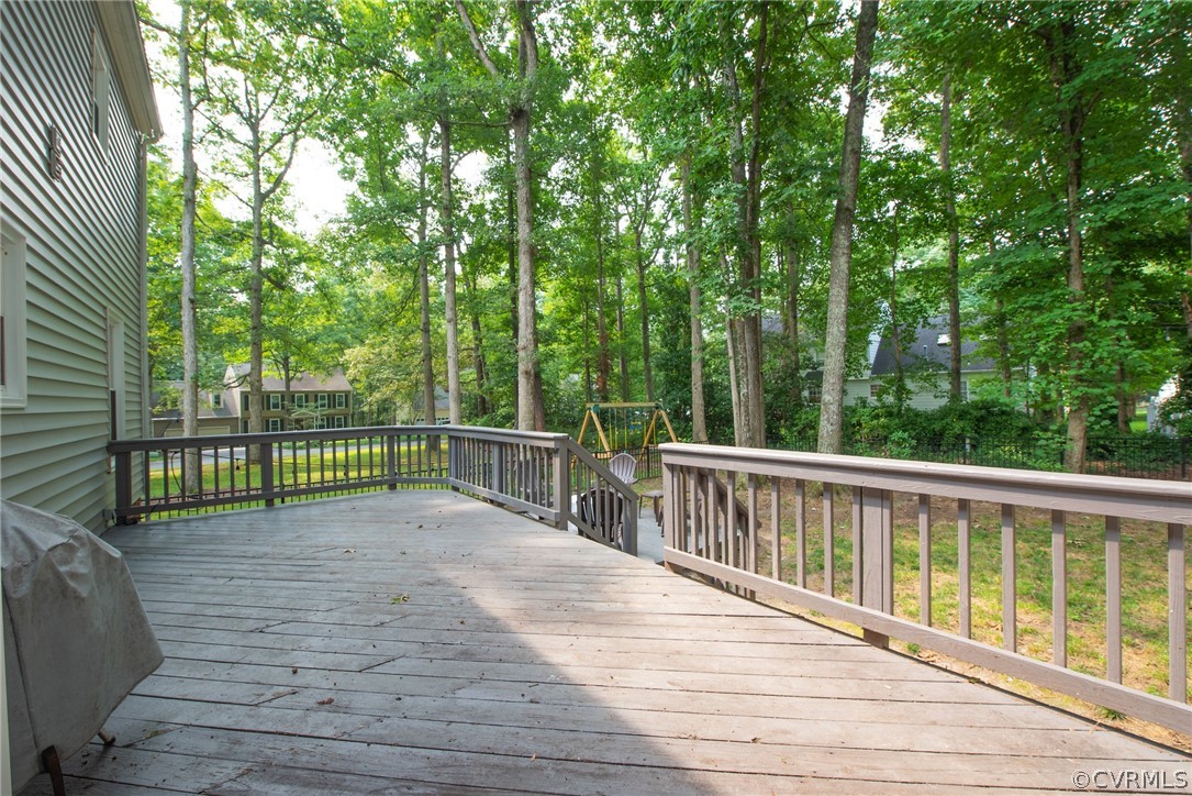 13810 Shadow Ridge Road Midlothian, VA 23112 - Photo 36 of 40 a view of a deck with a backyard