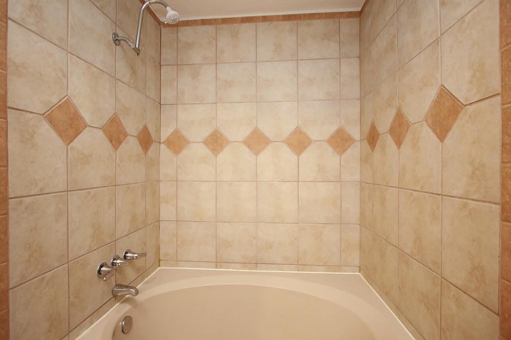23315 Montague Drive Spring, TX 77373 - Photo 15 of 24 a bathroom with a bathtub