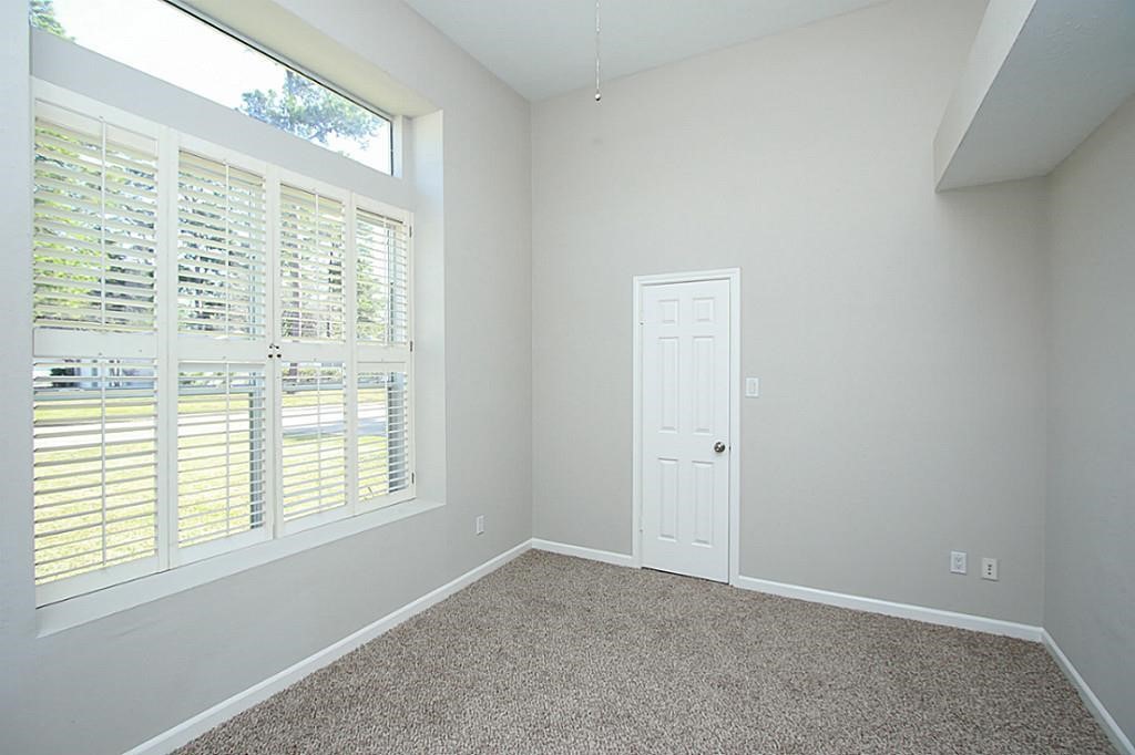 23315 Montague Drive Spring, TX 77373 - Photo 18 of 24 a view of an empty room with a window